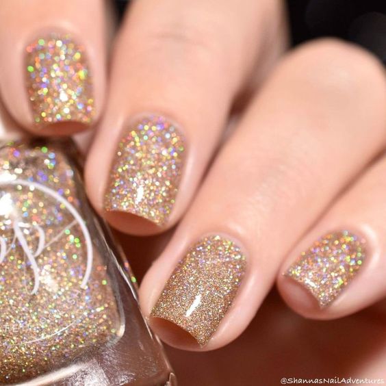 Gold glitter nail art